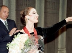File photo of Vladimir Putin clapping for prima ballerina Maya Plisetskaya at the Bolshoi Theatre in Moscow