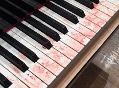 Blood on keys as international piano competition is suspended