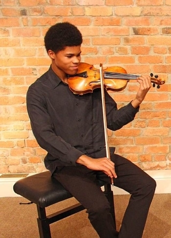 Young violinist tells Simon Cowell he hasn’t a clue about music