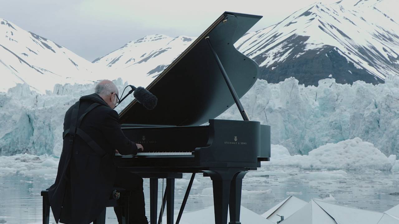 Global warming: Composer plays gloveless on Arctic glacier