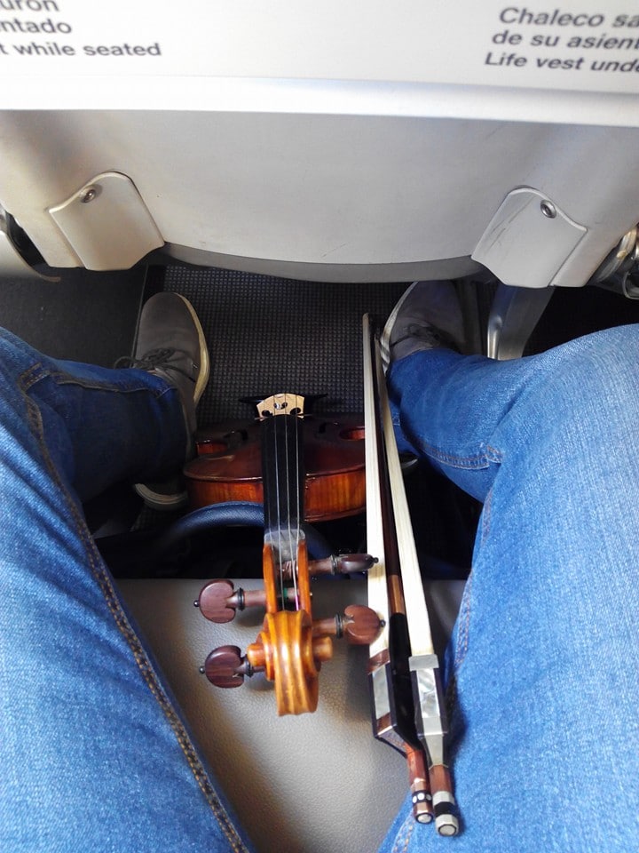 Where a bucket airline stows a violin