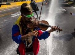 Venezuela violinist suffers hearing loss after police beating