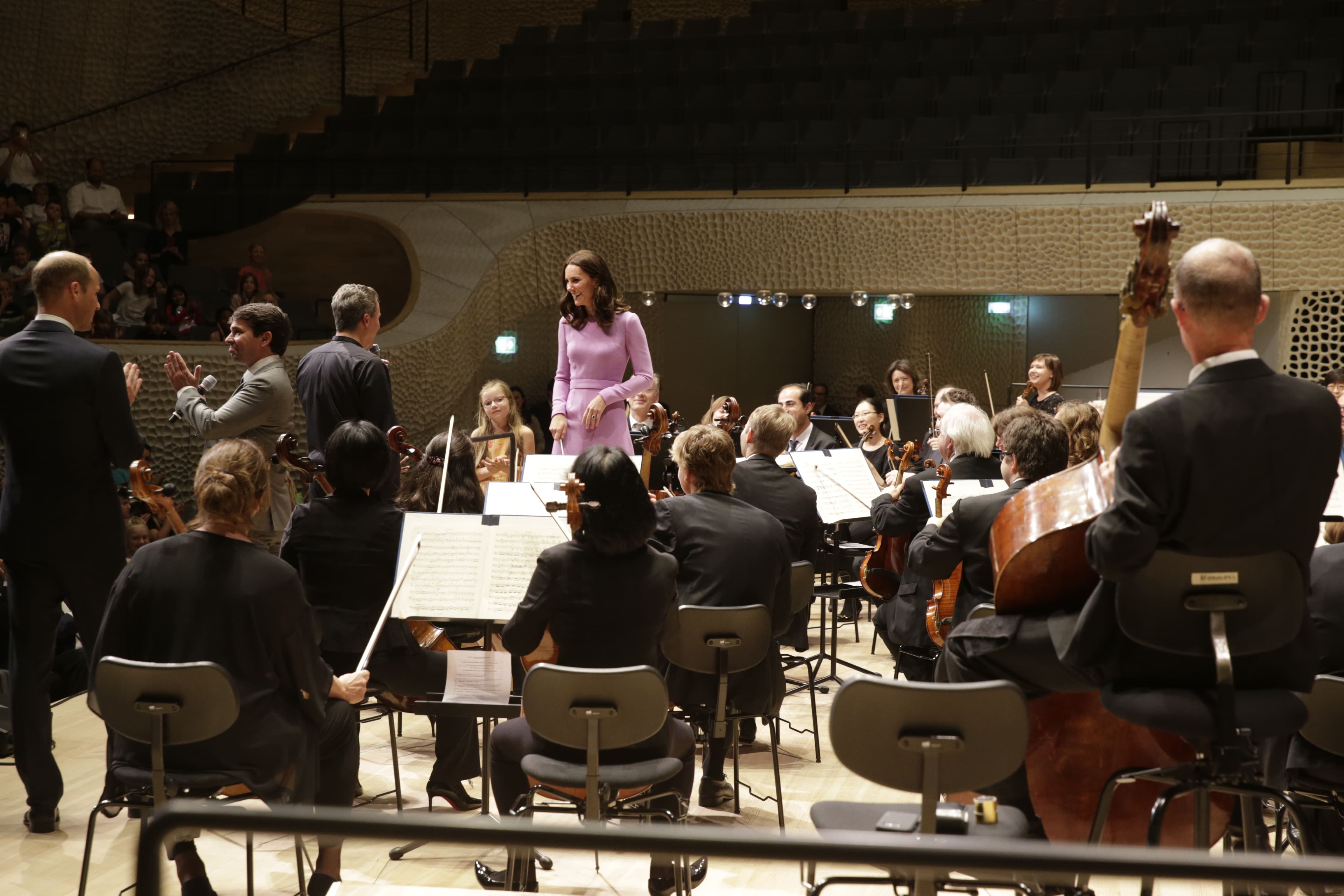 First pic: Princess Kate conducts German orchestra