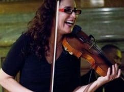An orchestra violinist in New York appeals for help with brain cancer