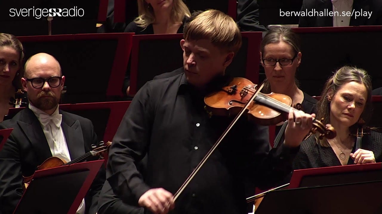 Another violinist switches bow for baton