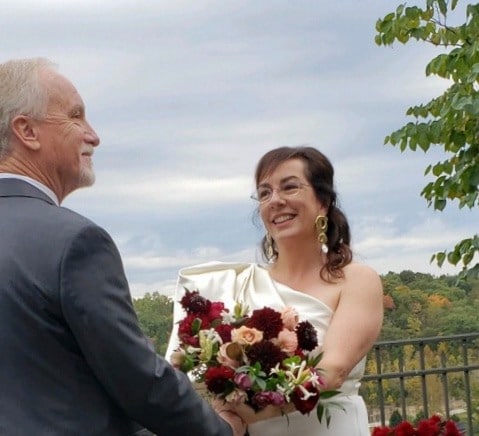 US orchestra chief balances budget, gets married, resumes rehearsal