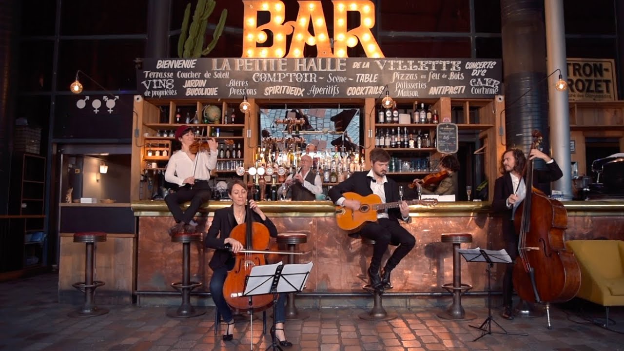 Six orchestra musicians meet in a bar on New Year’s