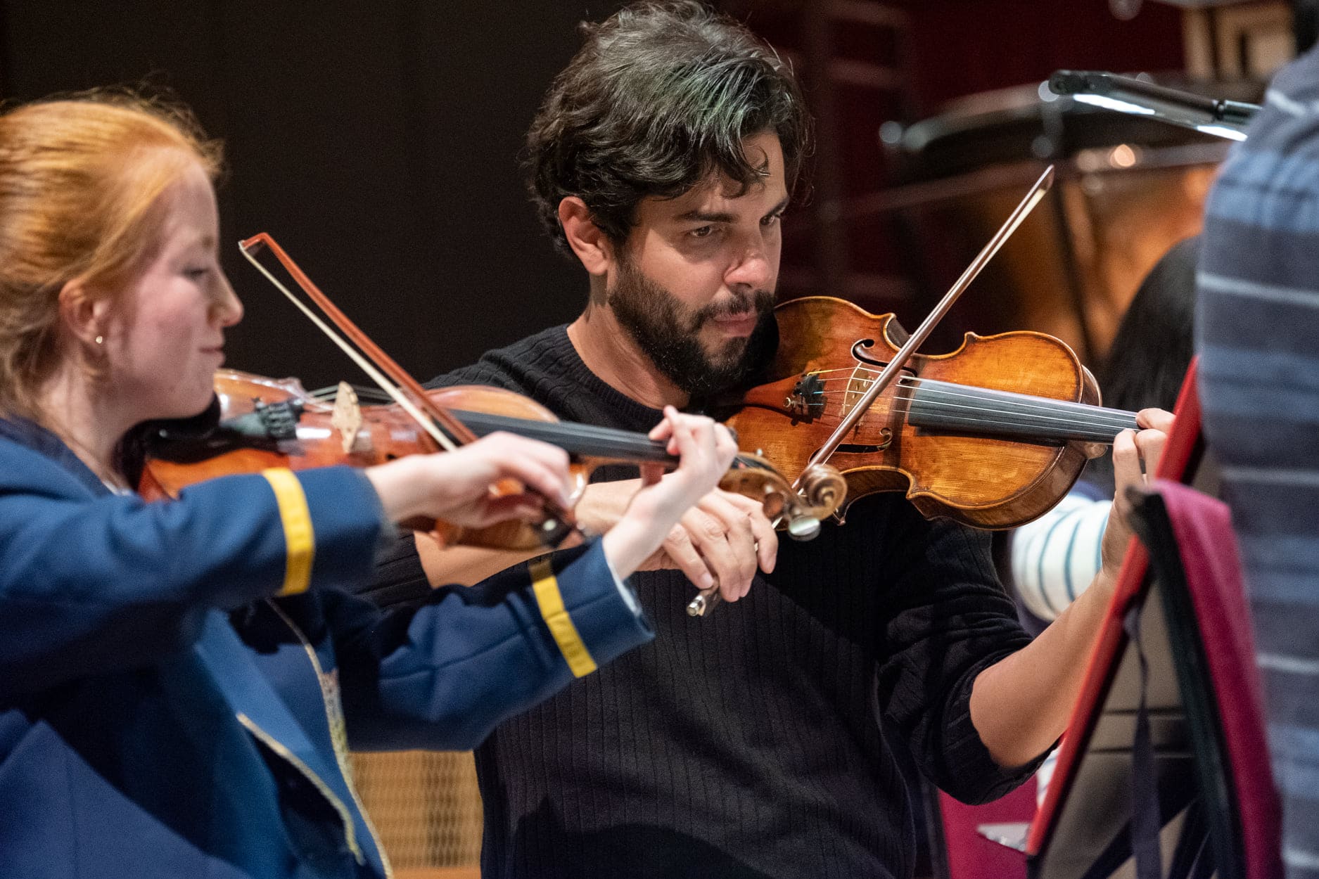 Music director prefers to play violin with youth orchestra