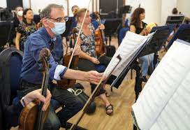 In Lebanon, the orchestra plays on