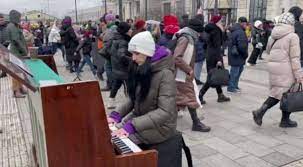 At Lviv station, a pianist plays ‘What a Wonderful World’