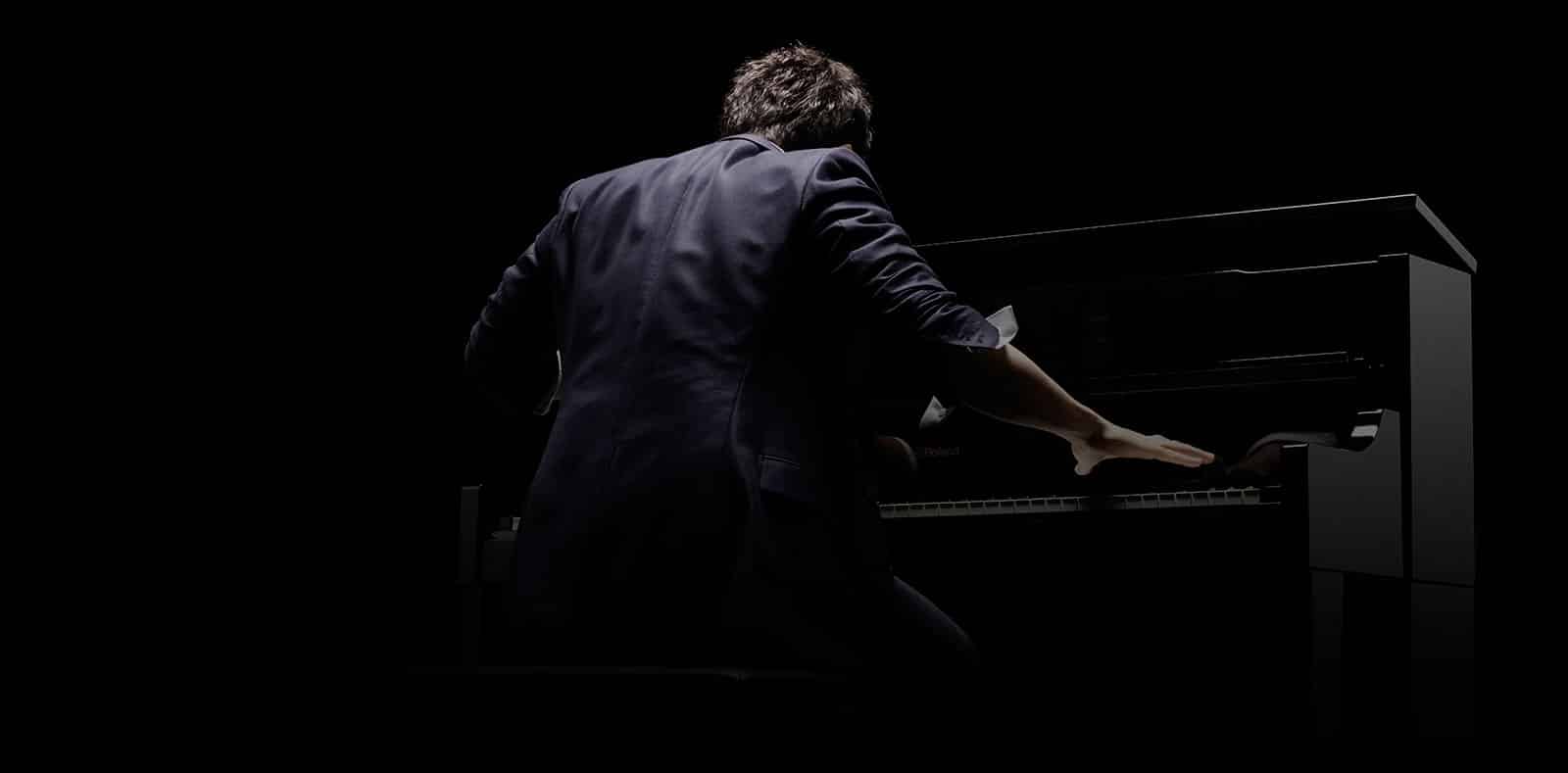 International pianist is questioned over porn pics