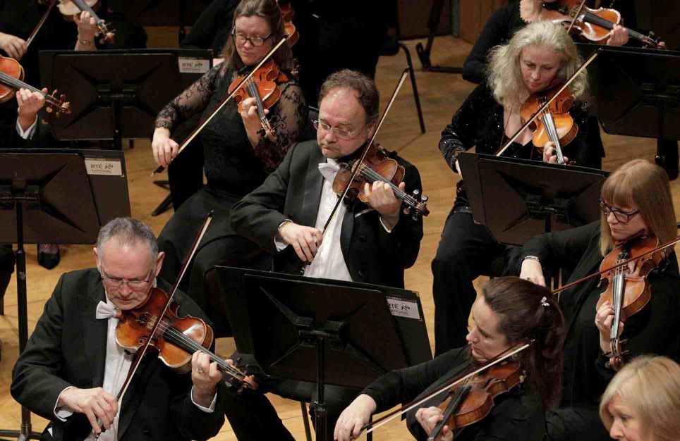 Dear Alma, Why do orchestra players look so glum?