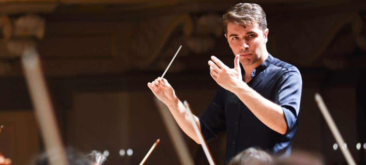 Young local conductor spares Canellakis tour embarrassment